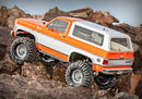 Traxxas / TRX-4® Scale and Trail™ Crawler with 1979 Chevrolet Blazer Body:  4WD Electric Truck with TQi Traxxas Link™ Enabled 2.4GHz Radio System (Orange)
