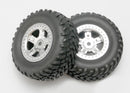 Tires and wheels assembled glued SCT satin chrome wheels SCT off-road racing tires foam inserts 1 each right & left